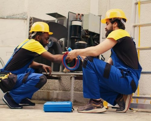 coworkers-servicing-hvac-system_482257-91024 coworkers-servicing-hvac-system_482257-91024